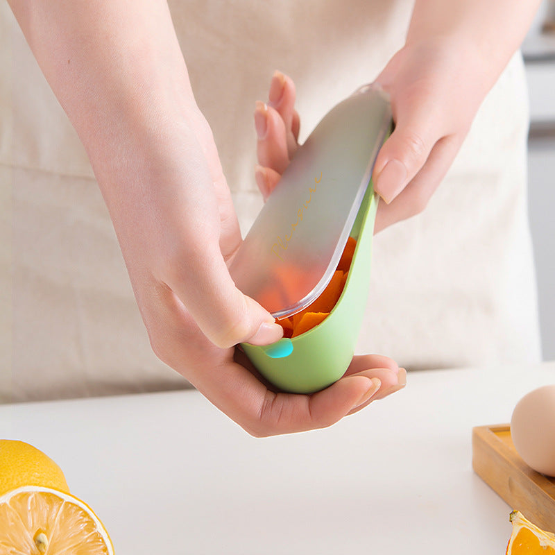 Fruit and Peeler With Storage Compartment