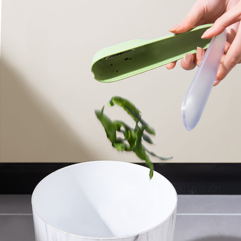 Fruit and Peeler With Storage Compartment